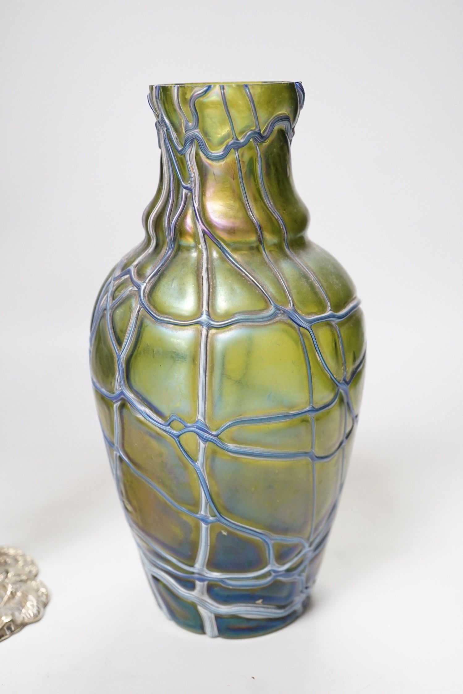 A Victorian thistle vase on cast plated base and a Pallme-Konig Art Nouveau glass vase